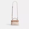 Rainer crossbody-väska 18 i Signature Canvas