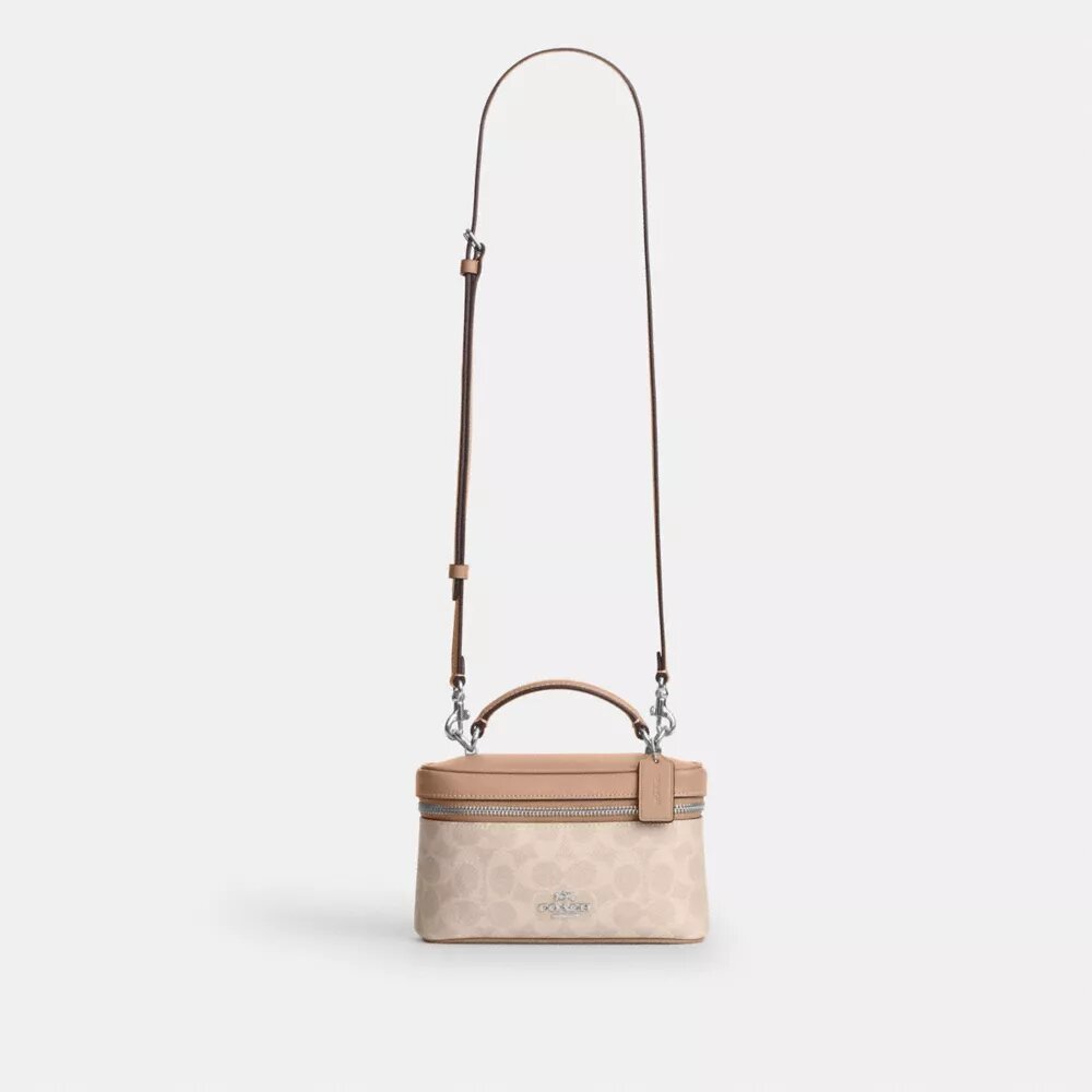 Rainer crossbody-väska 18 i Signature Canvas