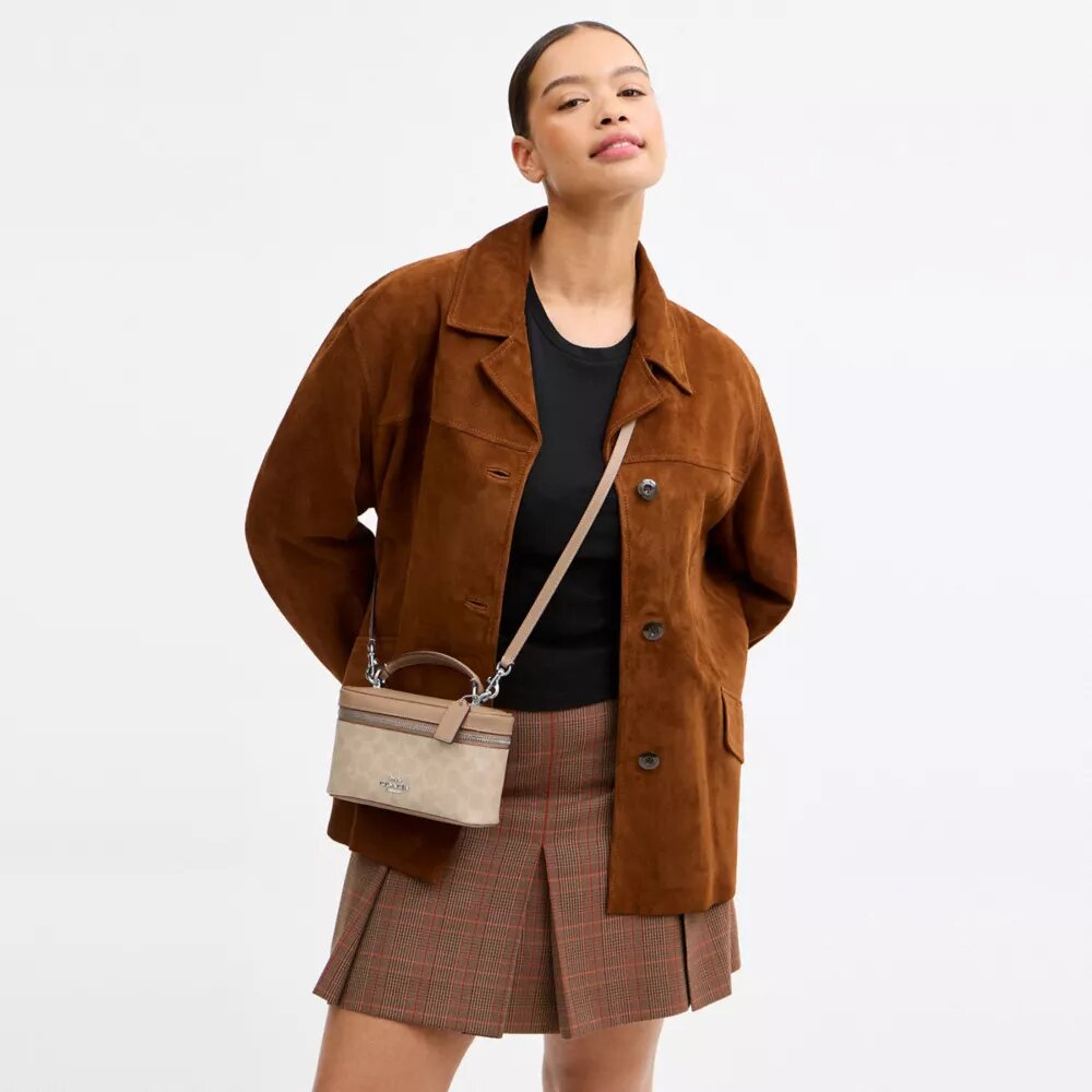 Rainer crossbody-väska 18 i Signature Canvas
