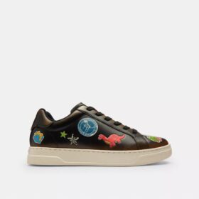 Rexy 10-årsjubileum Höga sneakers med klistermärkesmönster