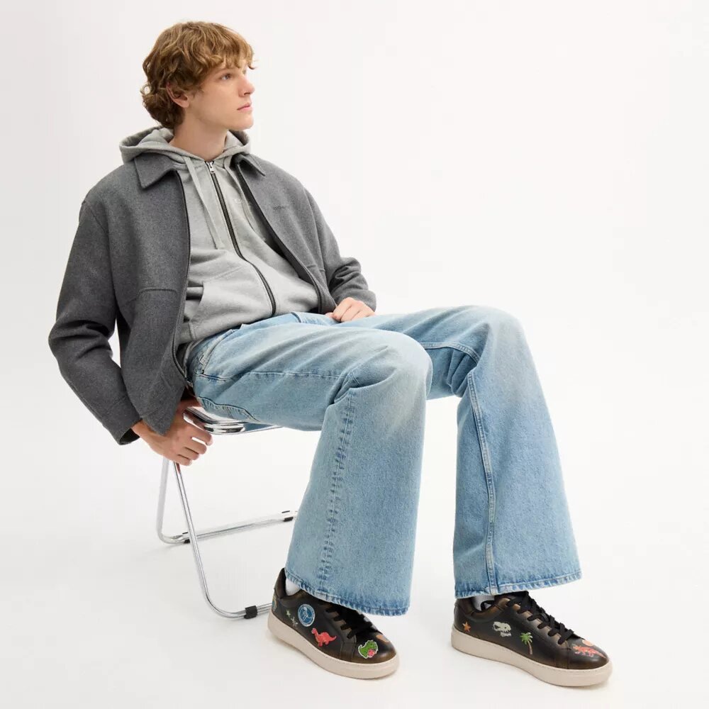 Rexy 10-årsjubileum Höga sneakers med klistermärkesmönster