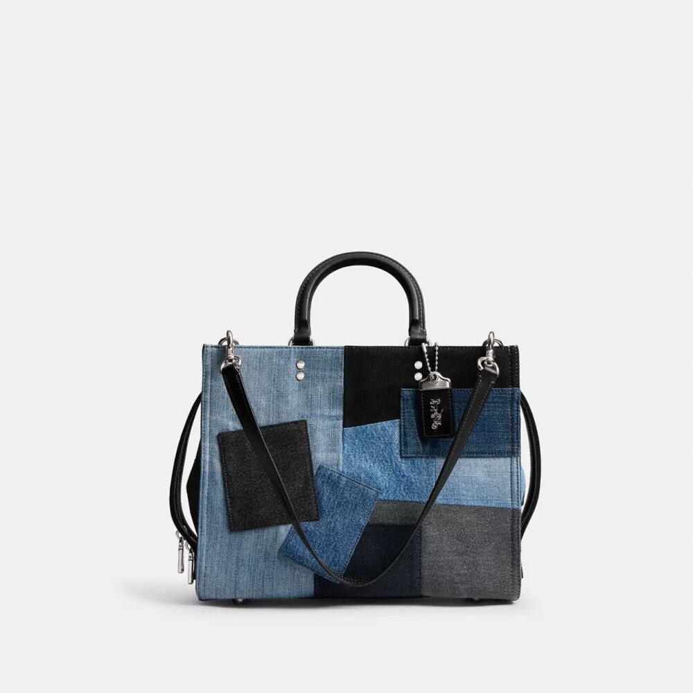 Rogue-väskor med lappverk av återanvänt denim