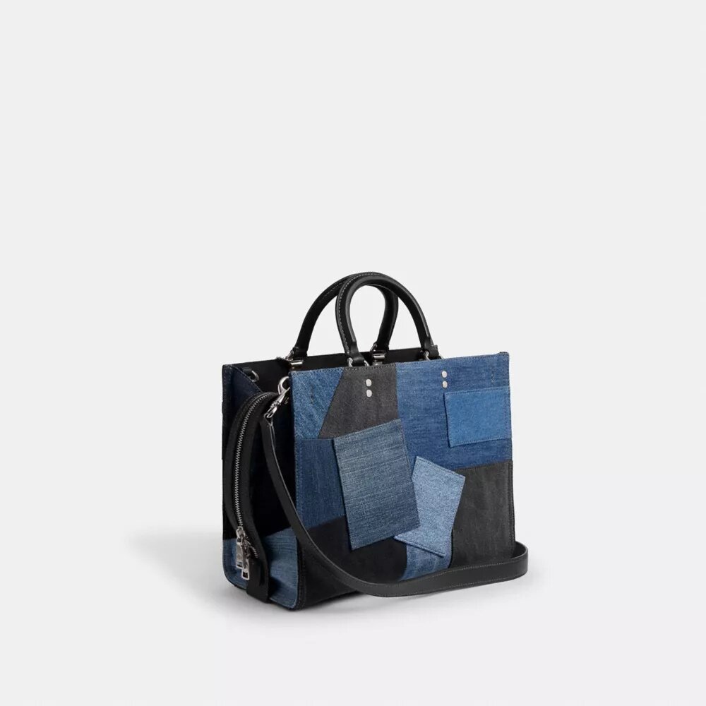 Rogue-väskor med lappverk av återanvänt denim