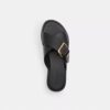 Sandaler med korsade remmar och spänne