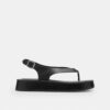 Skulpterad C-platåsandal