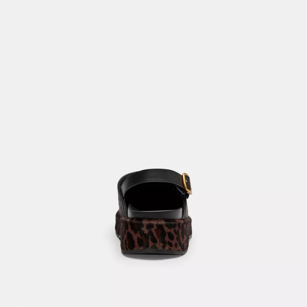 Skulpterad platåclog med leopardmönster
