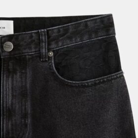 Svarta tapered-jeans i ekologisk bomull