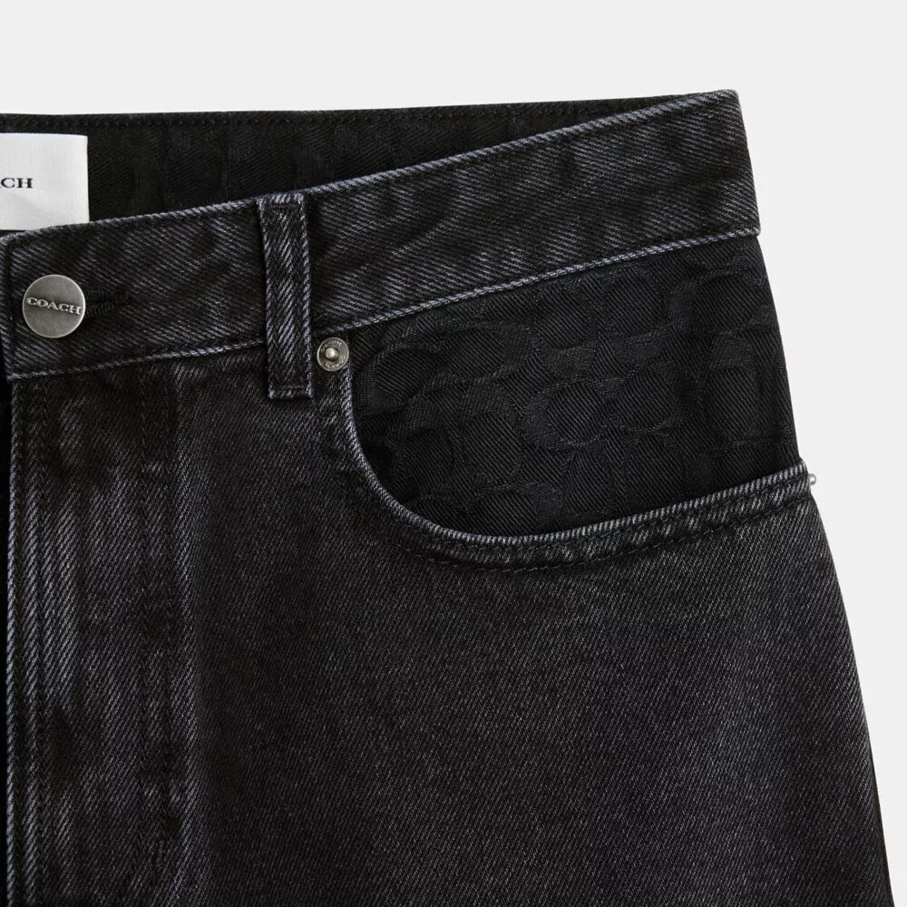 Svarta tapered-jeans i ekologisk bomull