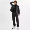 Svarta tapered-jeans i ekologisk bomull