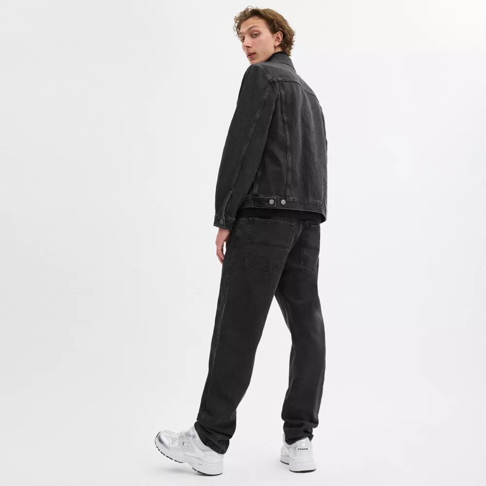 Svarta tapered-jeans i ekologisk bomull