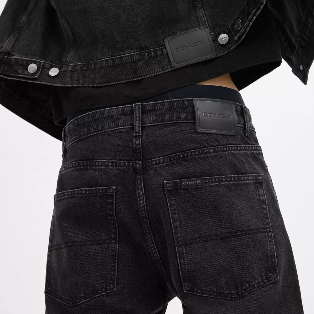 Svarta tapered-jeans i ekologisk bomull