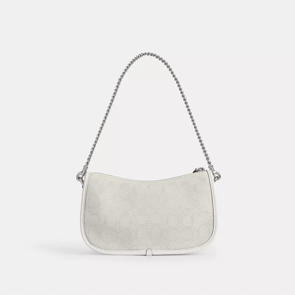 Swinger-väskor i signaturjacquard