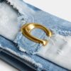 Tabby-axelremsväskor 26 med patchwork av återanvänt denim