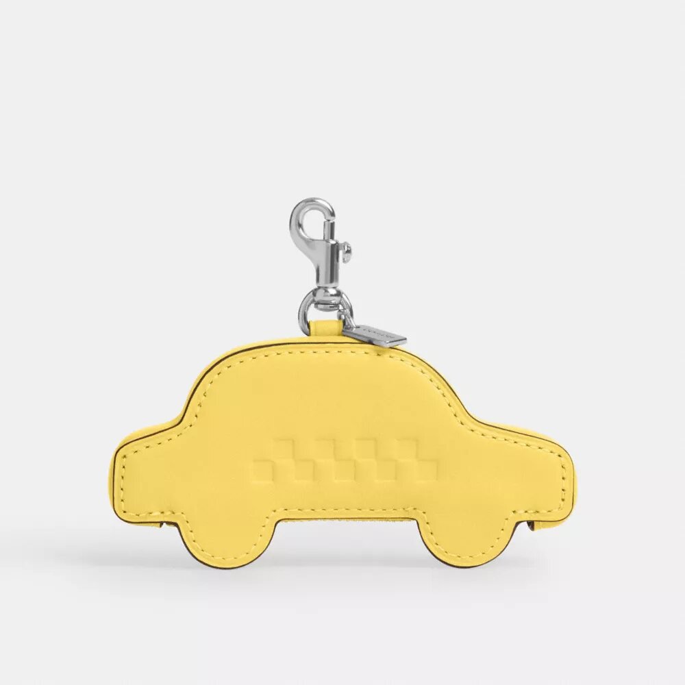 Taxi-väsksmycke