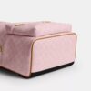 Taylor liten ryggsäck i Signature Canvas med smycken
