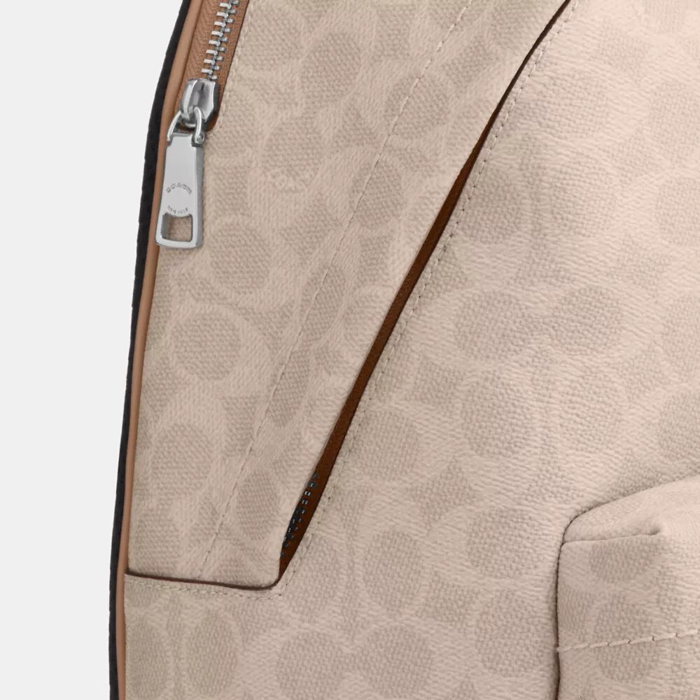Taylor Small-ryggsäck i Signature Canvas
