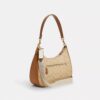 Teri Hobo-väska i Signature Canvas med rand