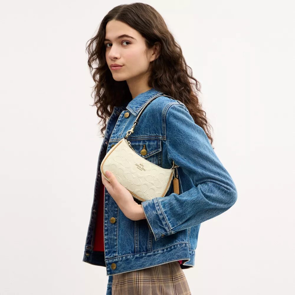 Teri Mini-crossbodyväska i signaturläder