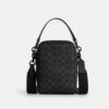 Tristan crossbody-väska 14 i Signature Canvas