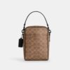 Tristan crossbody-väska 14 i Signature Canvas