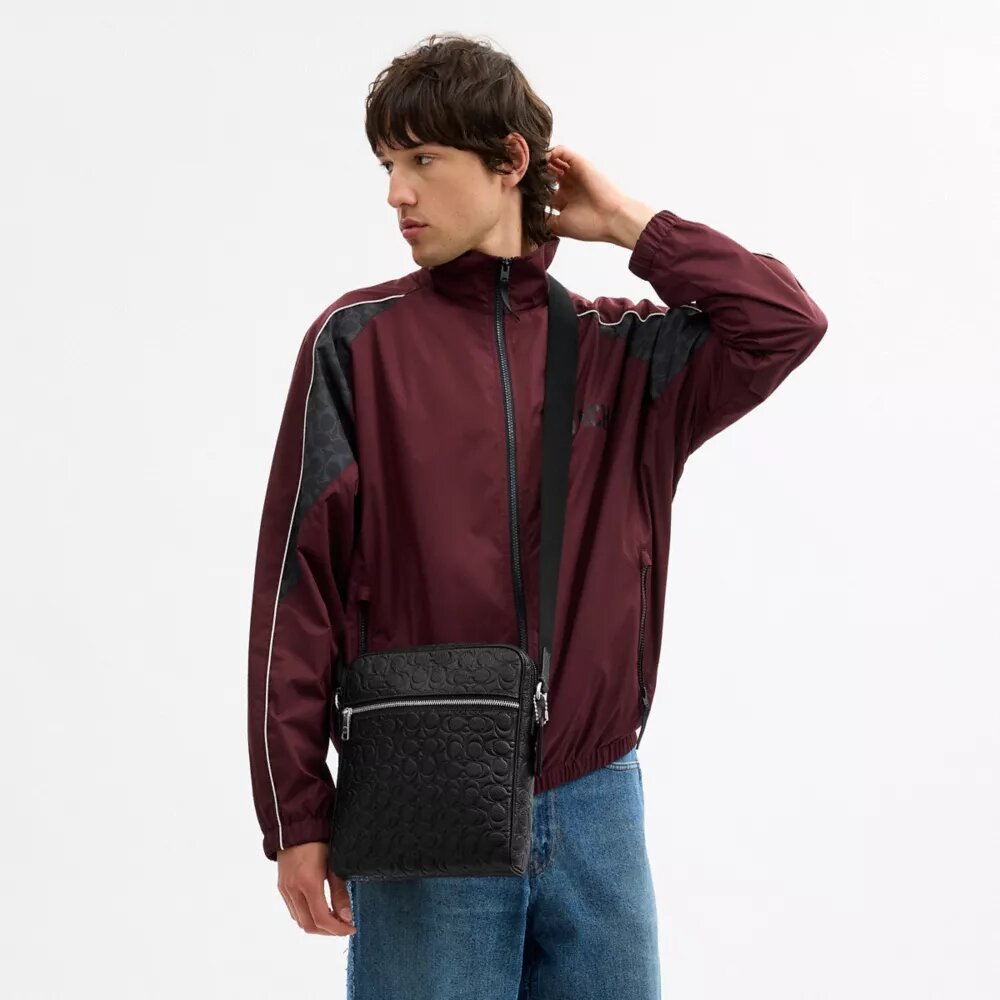 Tristan crossbody-väska 22 i signaturläder