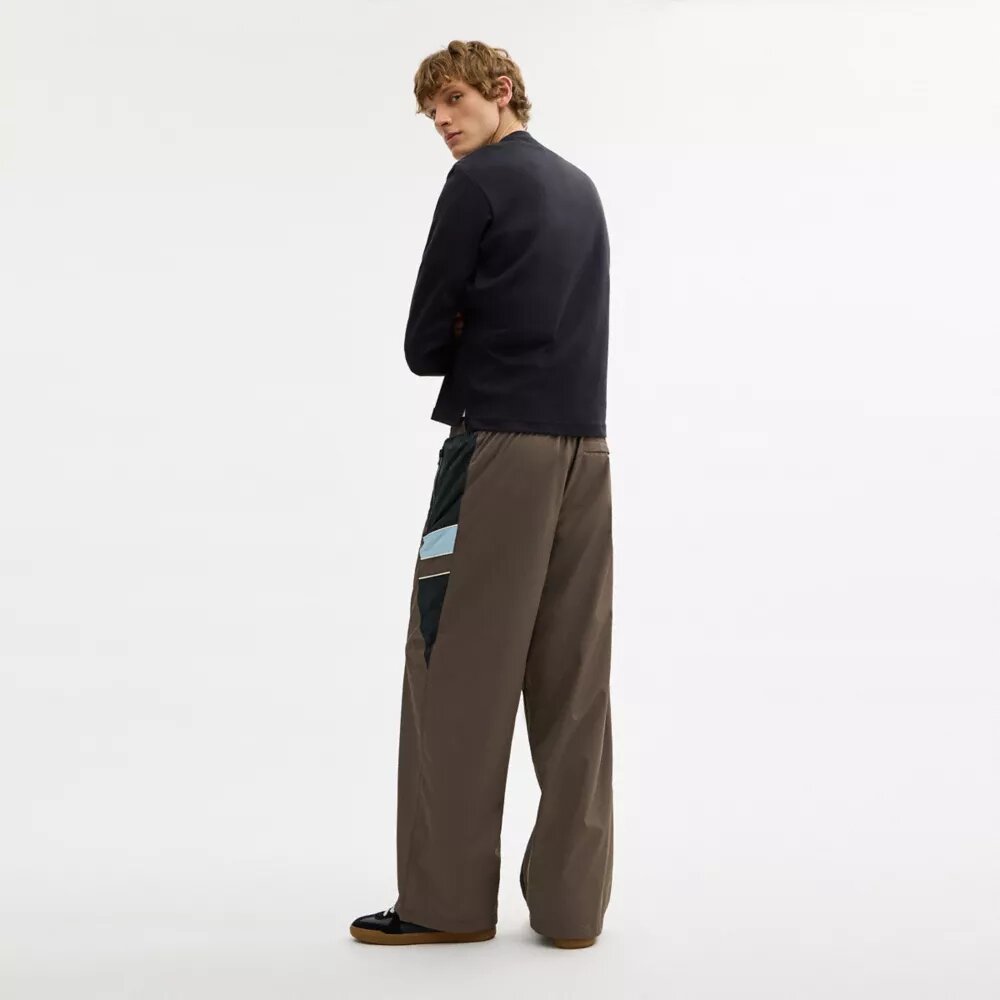 Träningsbyxor med raka ben i återvunnen polyester