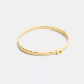 Tunt armband med vår signatur och gångjärn