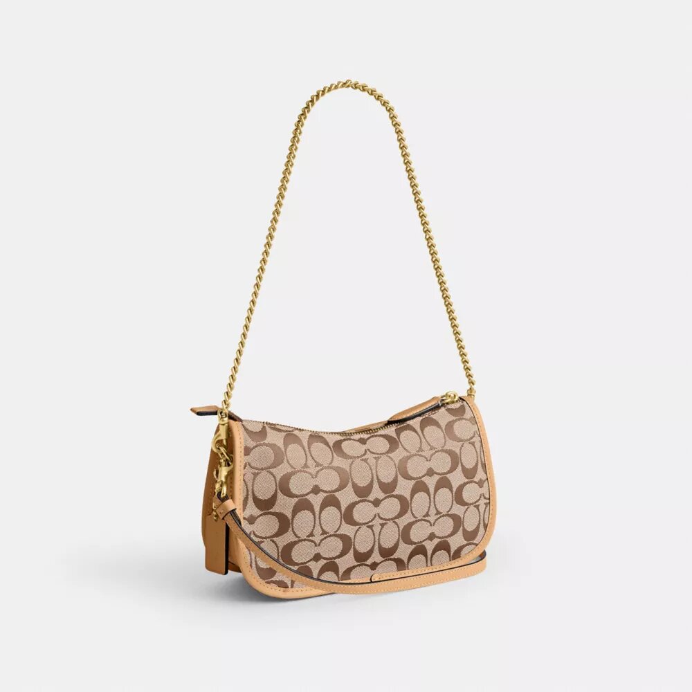 Waverly-väskor med dubbla Turnlock-lås i vår signaturjacquard